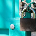 a close up of a padlock on a door